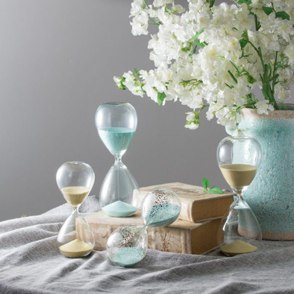 Artekko Hourglass Γυάλινη Διακοσμητική Κλεψύδρα με Γαλάζια Άμμο (9x9x25.5)cm         73229-JADE